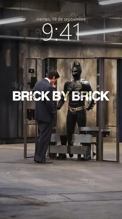 Versión de móvil: Póster vertical con la frase «Brick by brick»